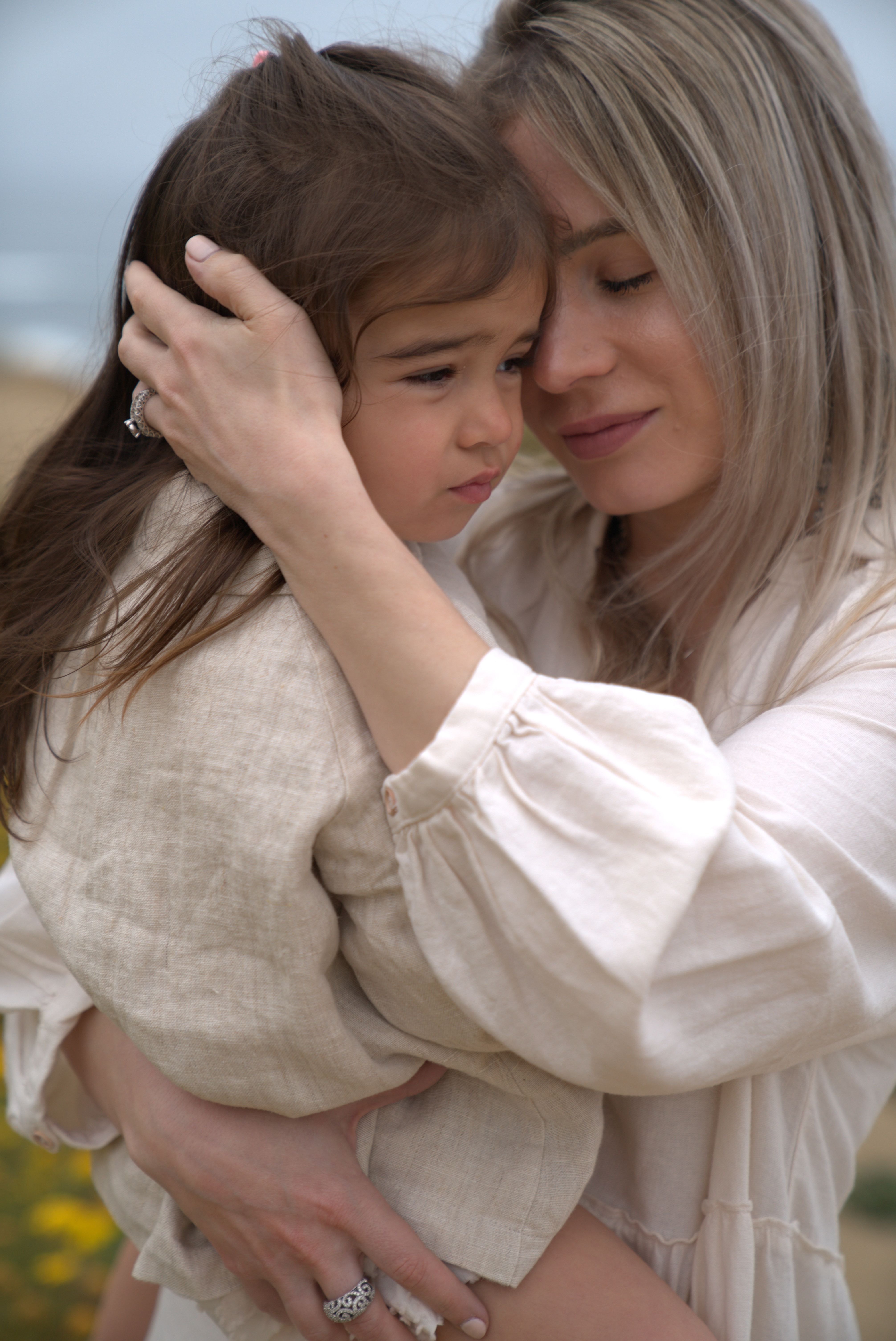 THE MOTHER'S EMBRACE